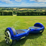 Sleek Hoverboard on a sunny summer day in a scenic UK park.